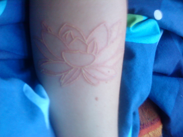 I've gotten my fifth tattoo. The White Lotus